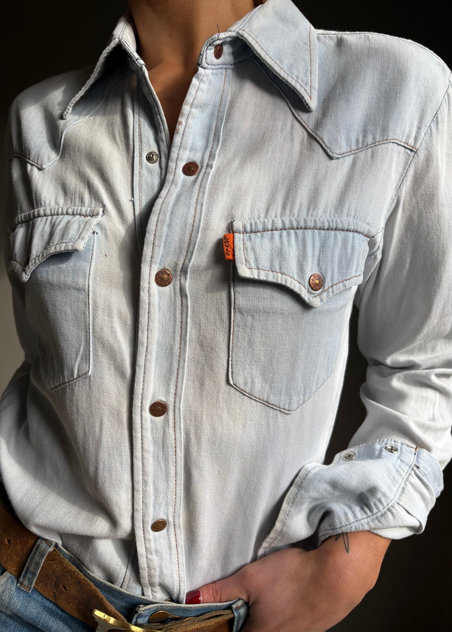 Washed out white Levi’s shirt