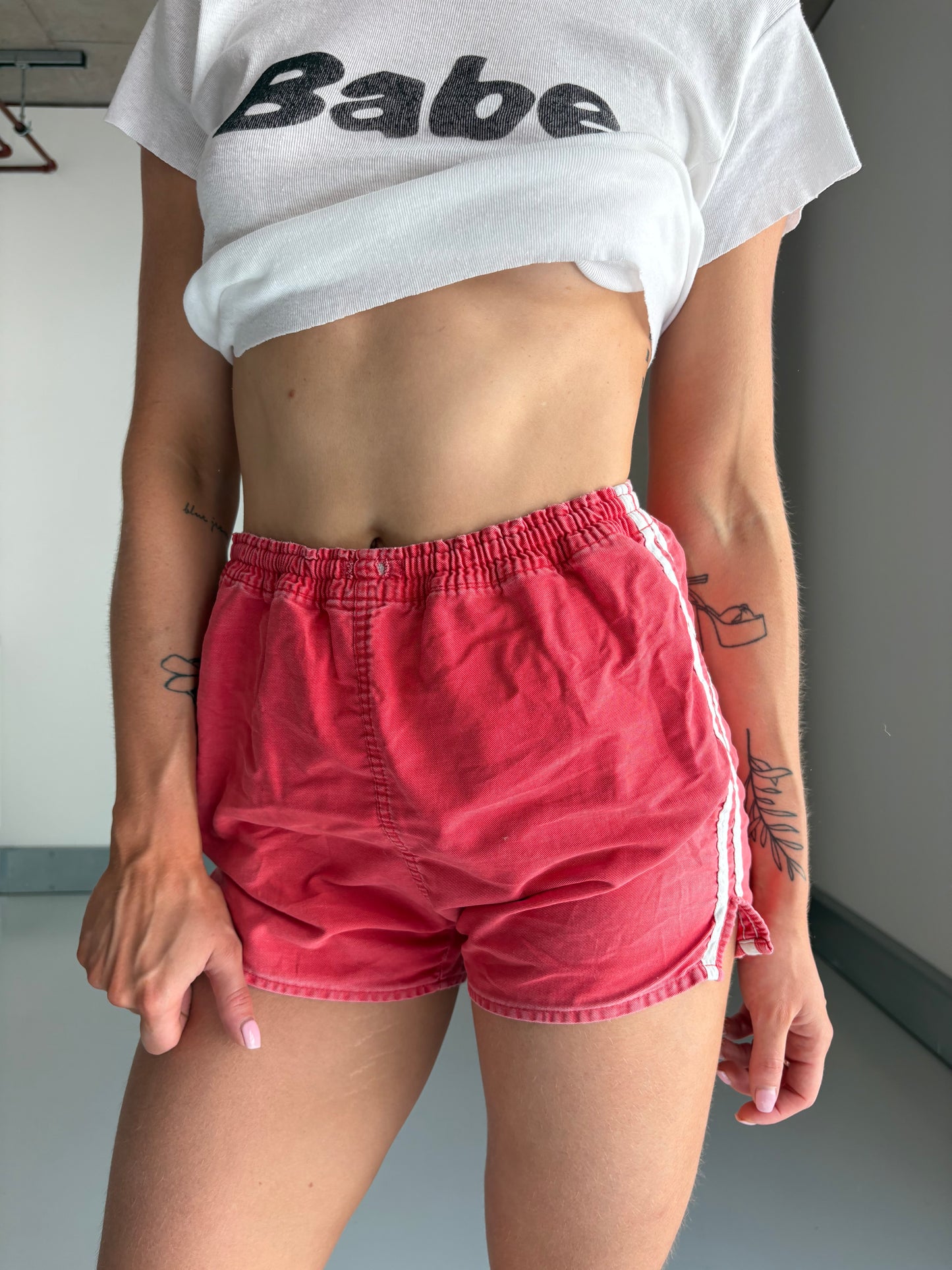 faded red sports shorts