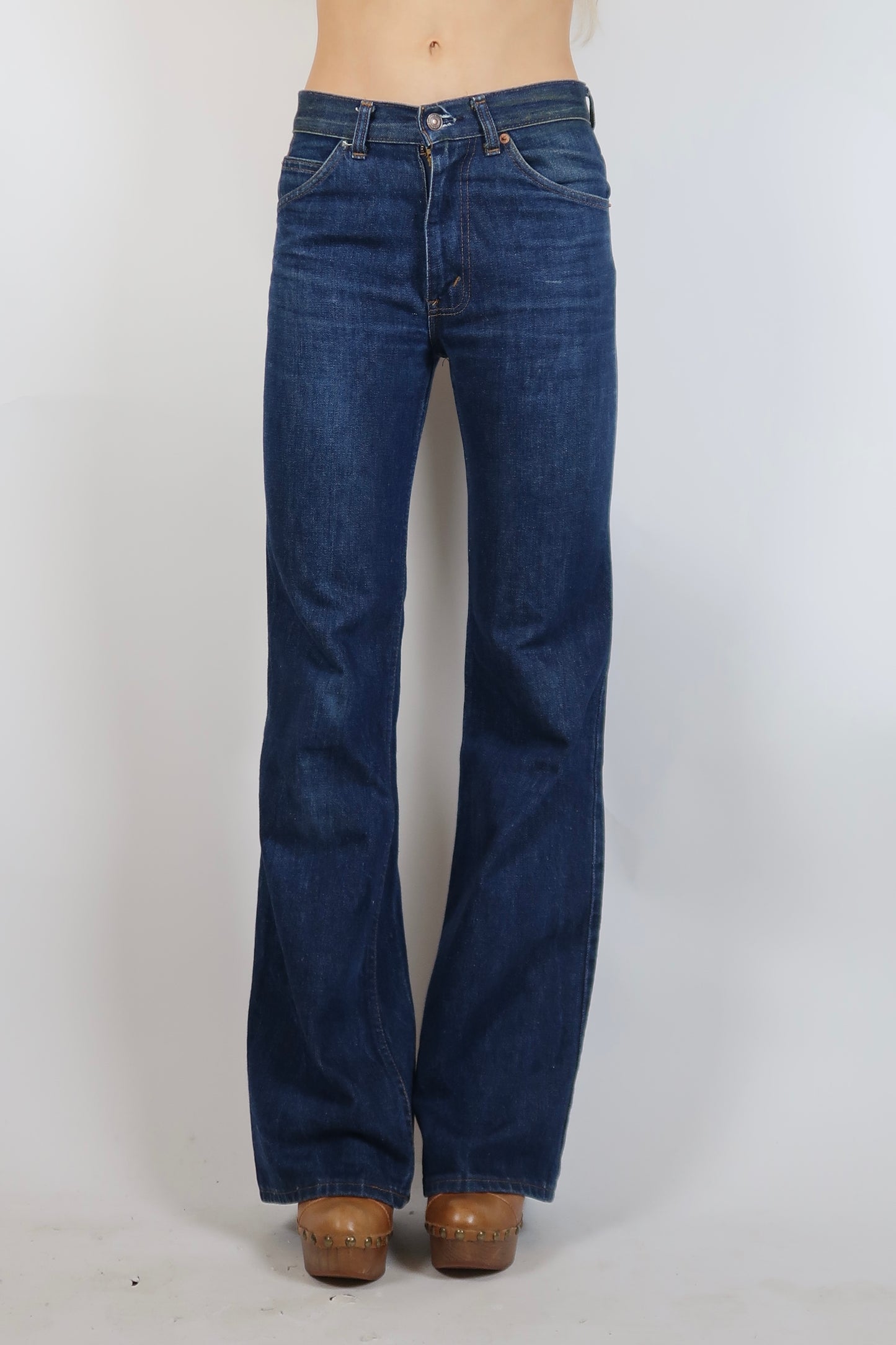 1970s Orange tab dark wash flare jeans