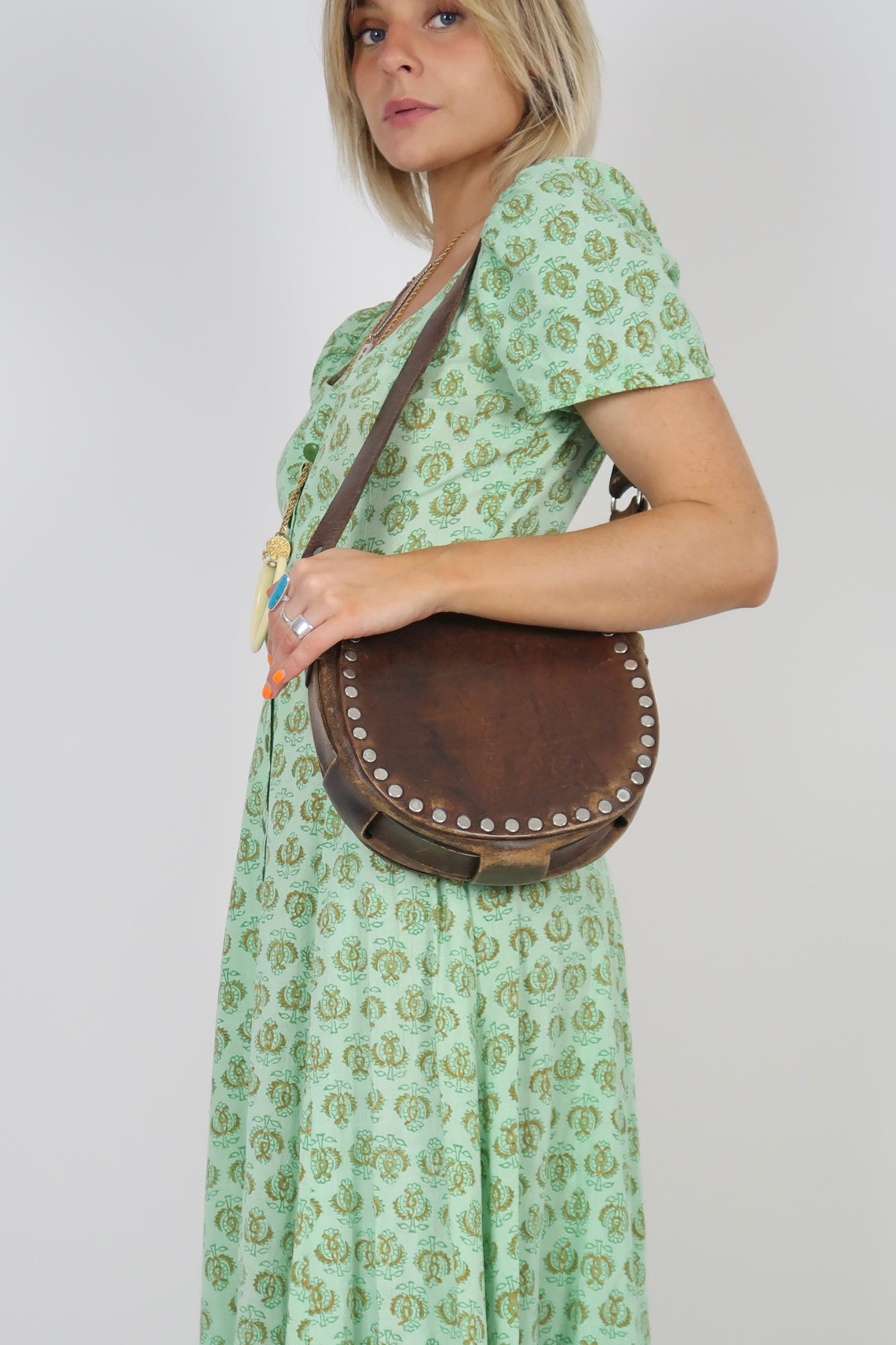 1970s tooled leather bag with studs