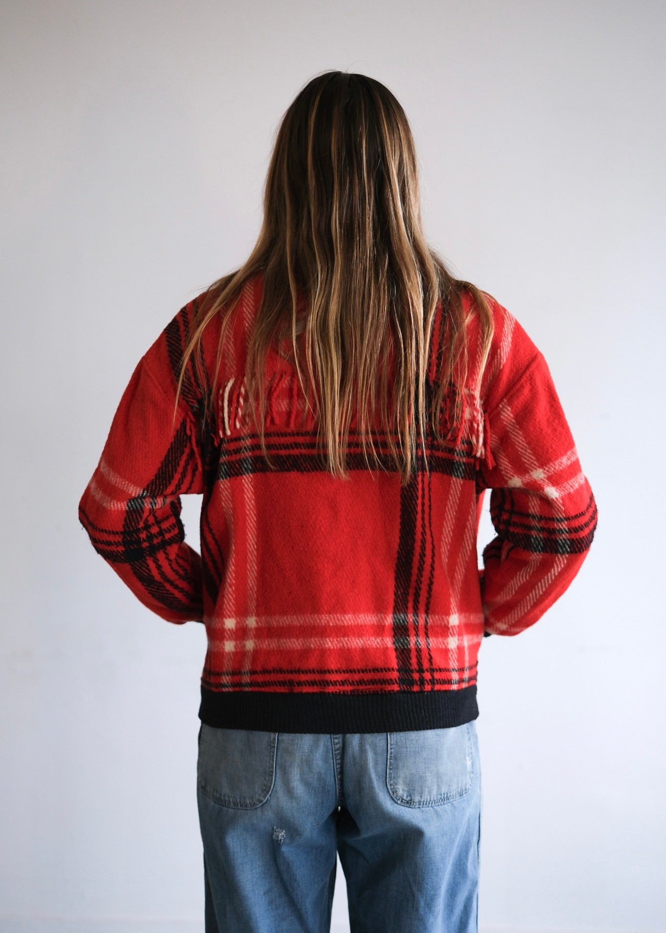 Plaid fringe bomber