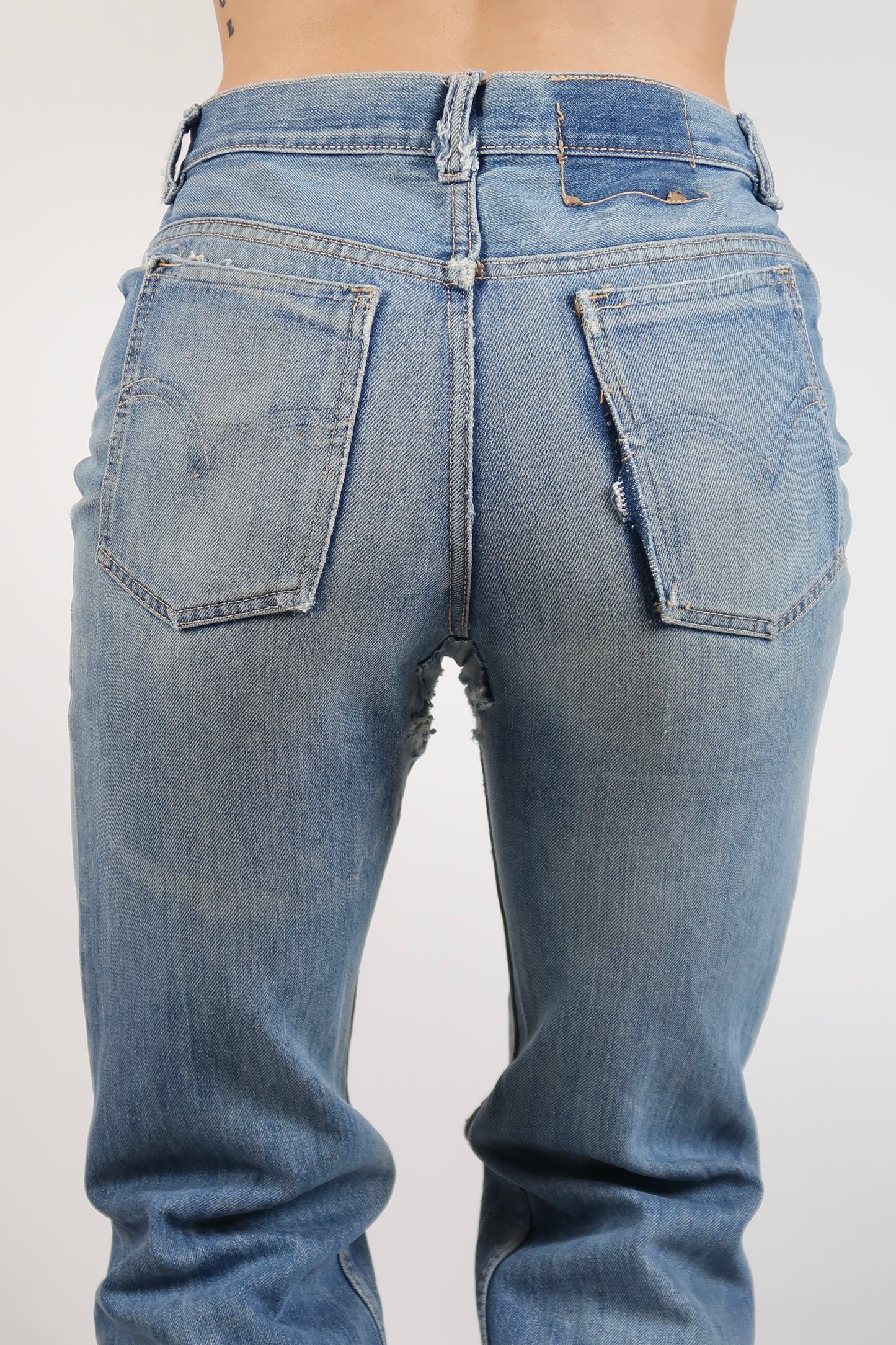 Early 1970s super worn in straight leg jeans