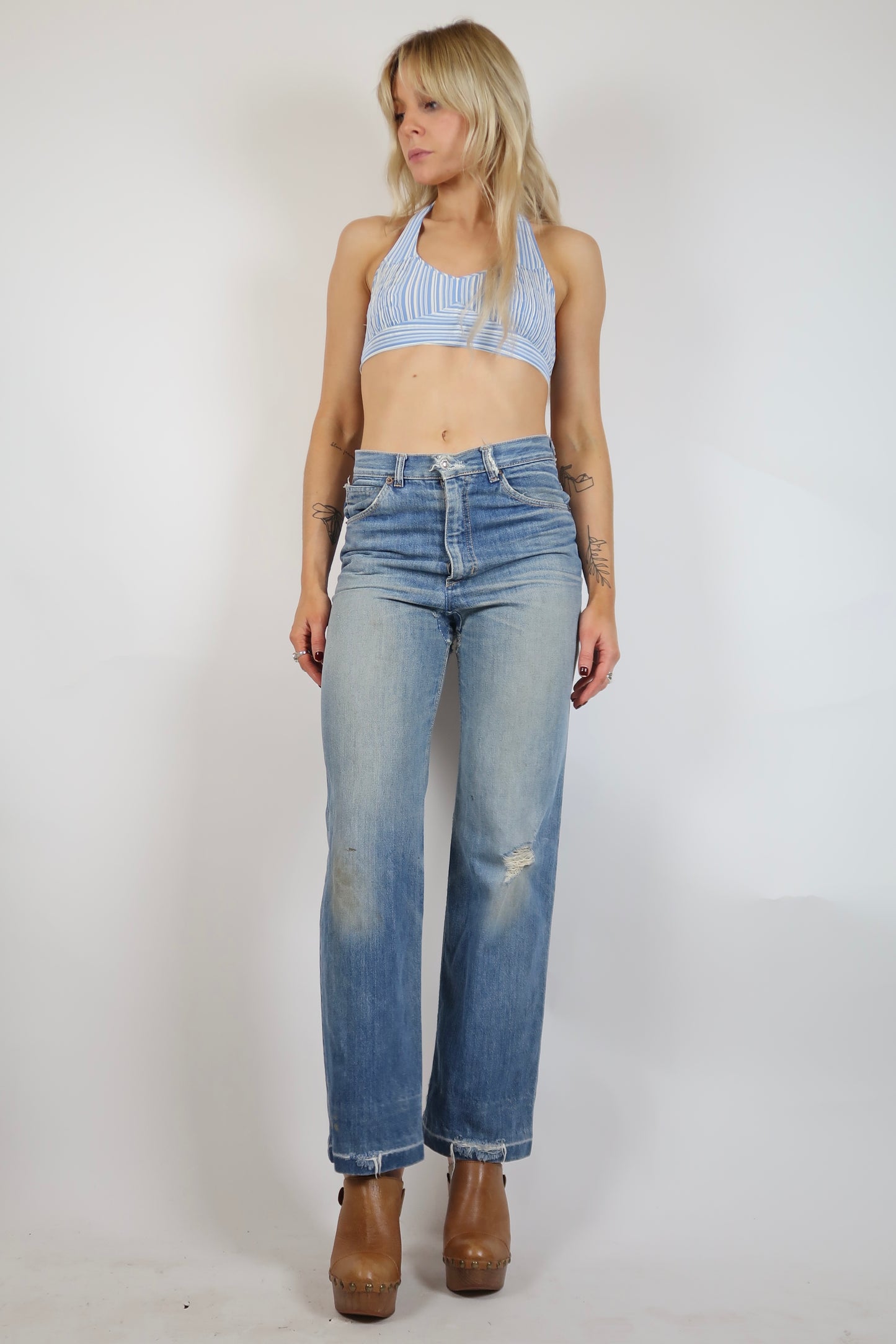 Early 1970s super worn in straight leg jeans