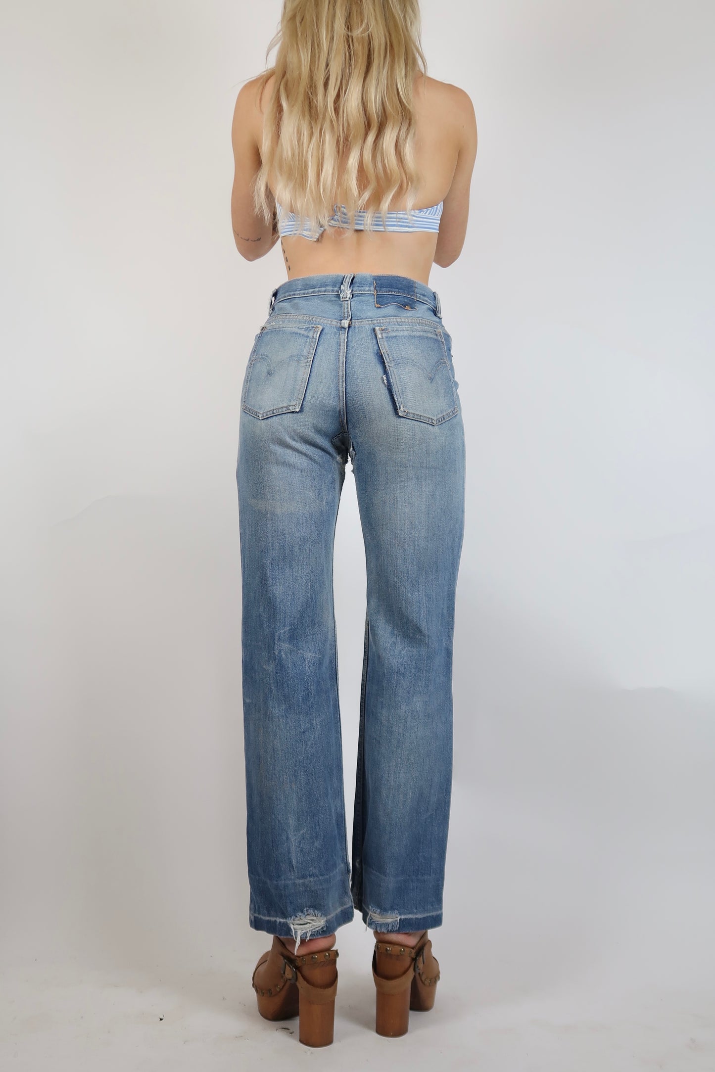 Early 1970s super worn in straight leg jeans