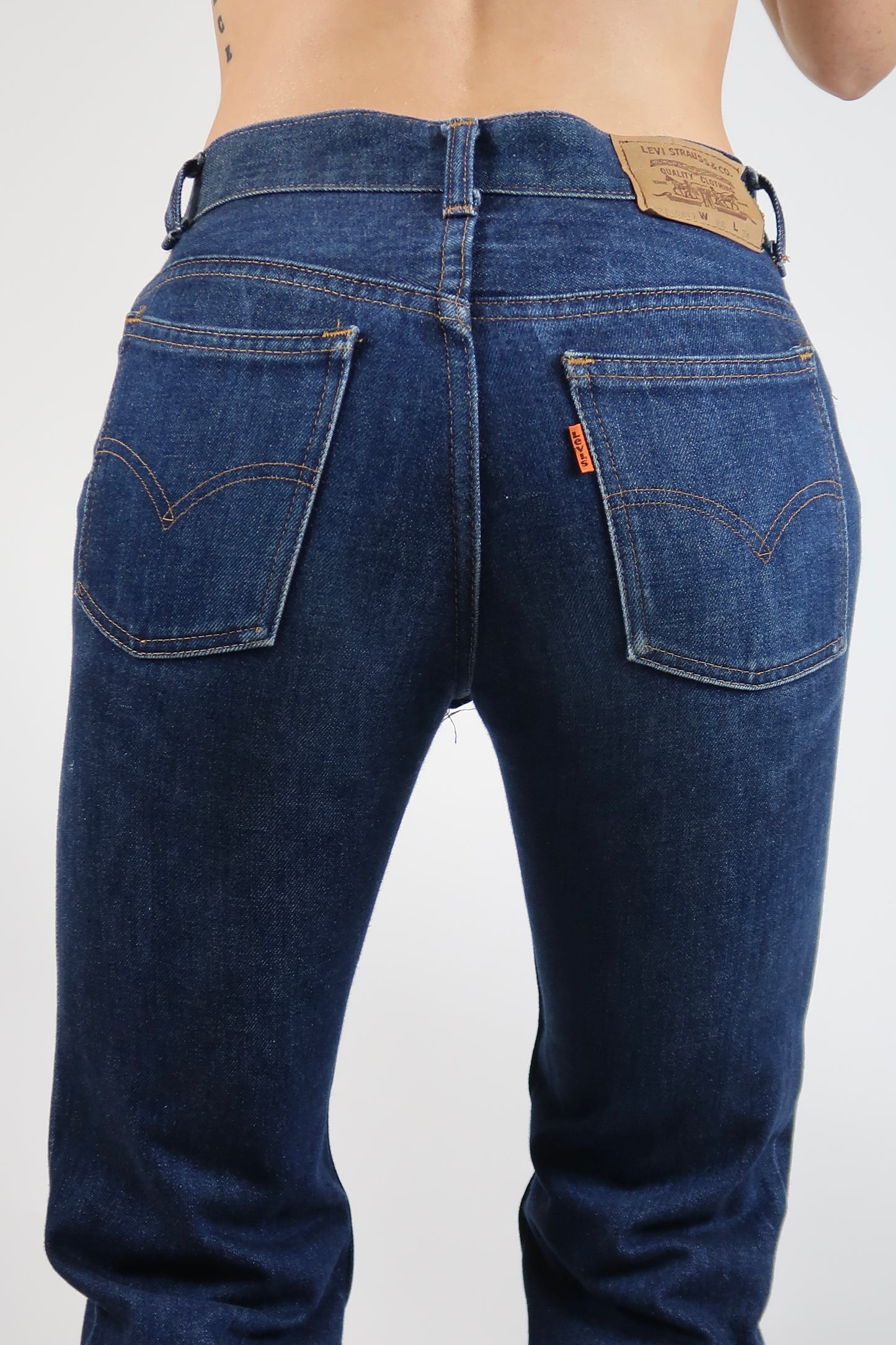 1970s Orange tab dark wash flare jeans