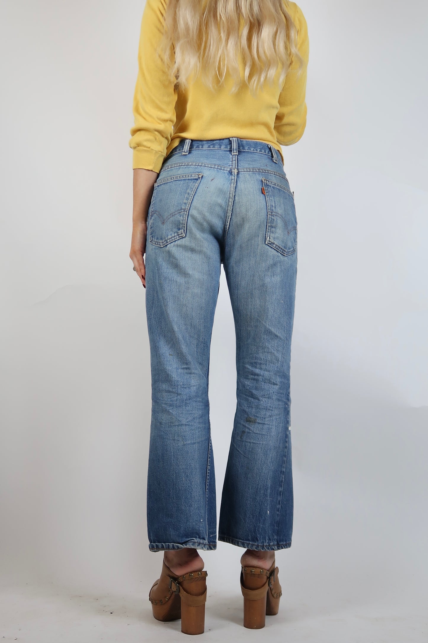 1970s Orange tab Levis with paint and and rips