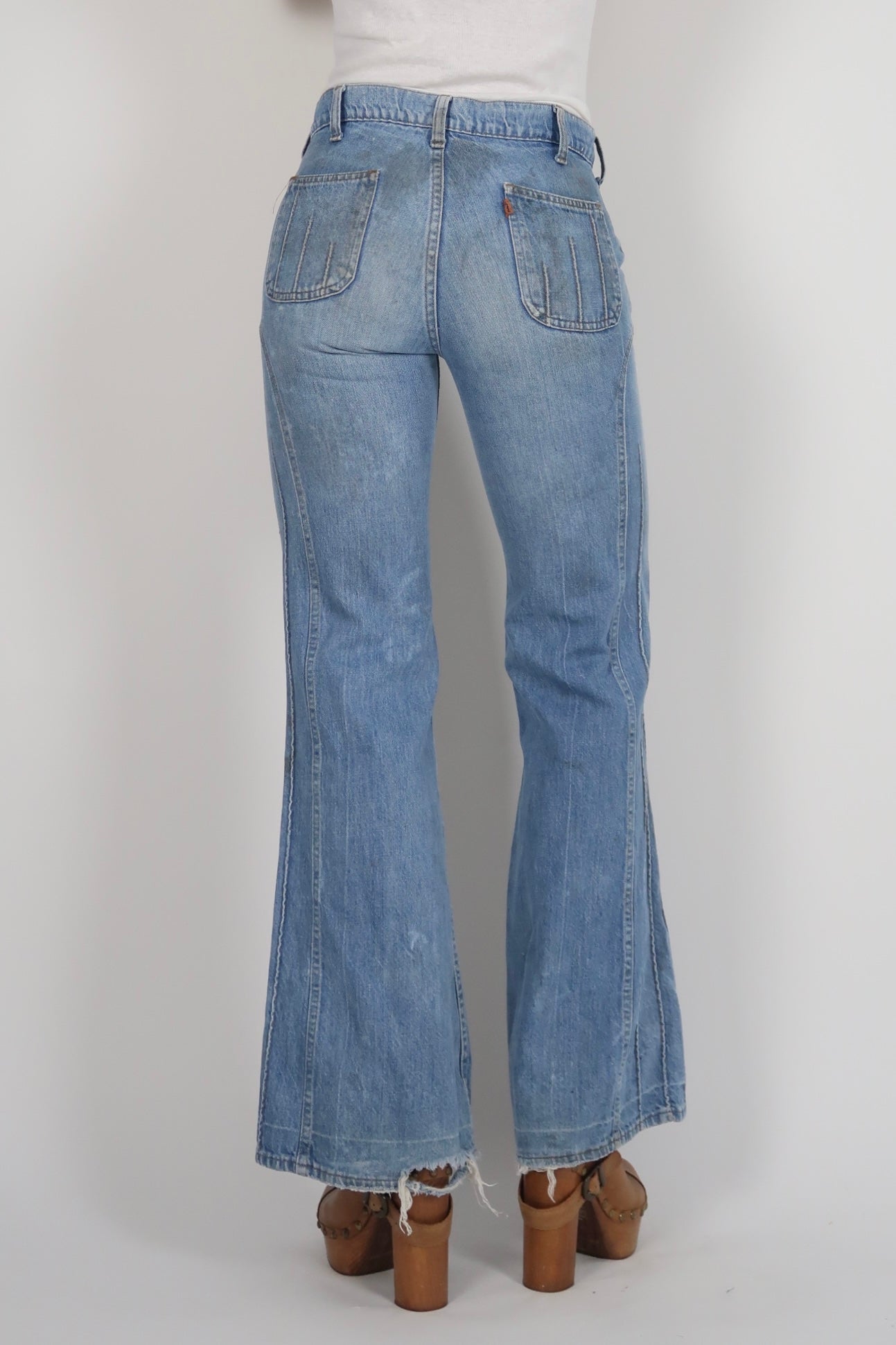 1970s orange feather tab jeans