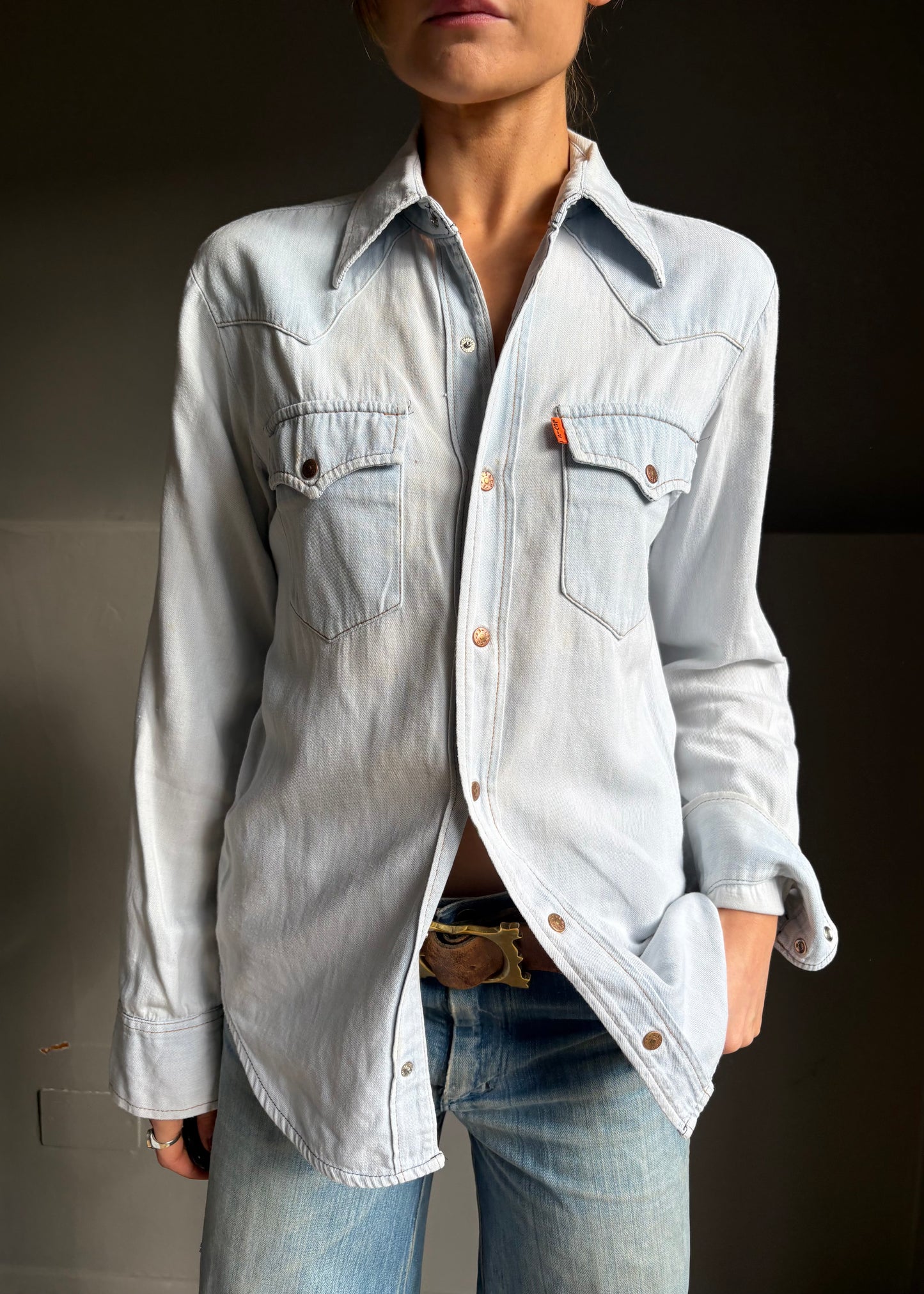 Washed out white Levi’s shirt