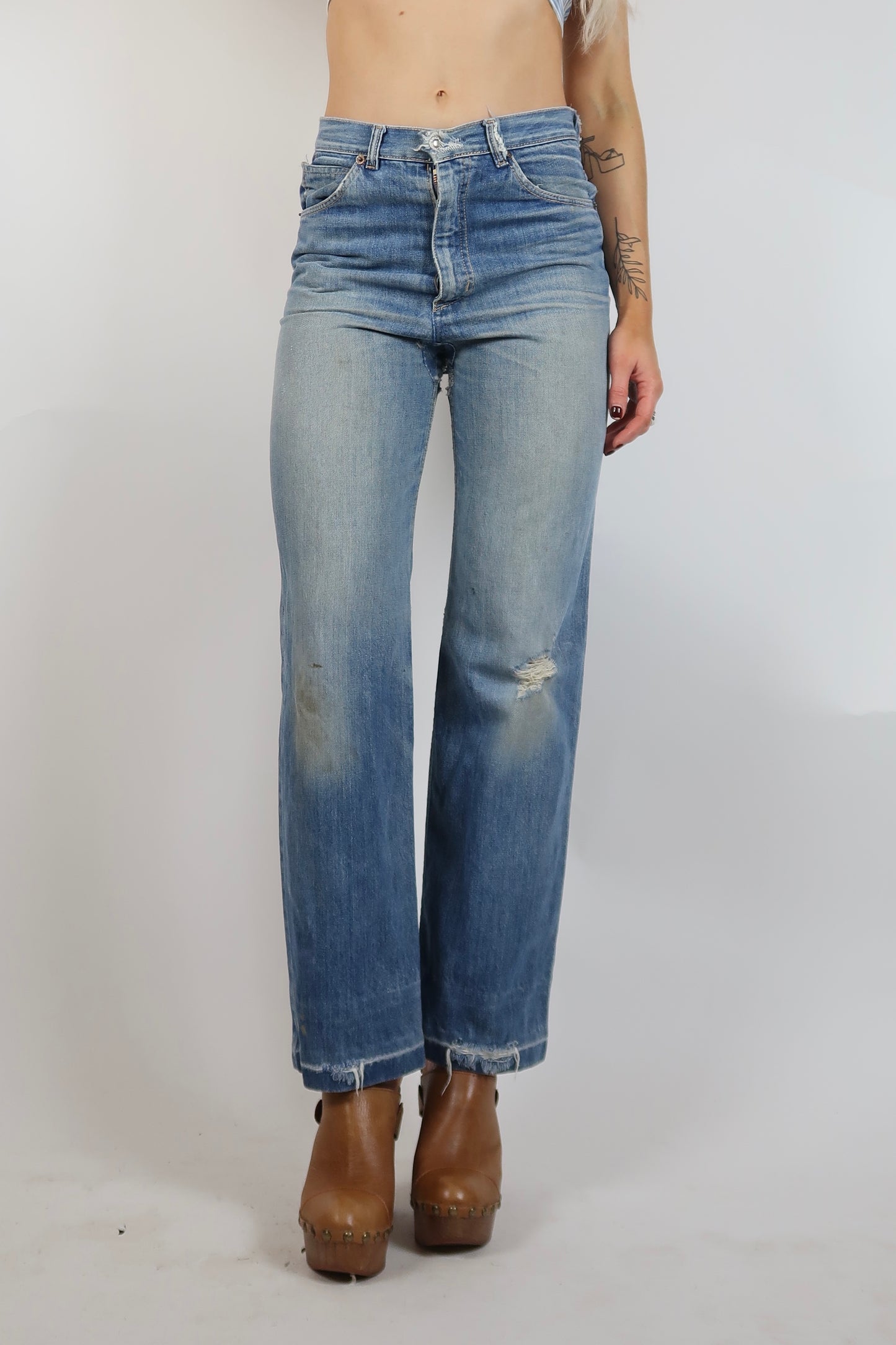 Early 1970s super worn in straight leg jeans