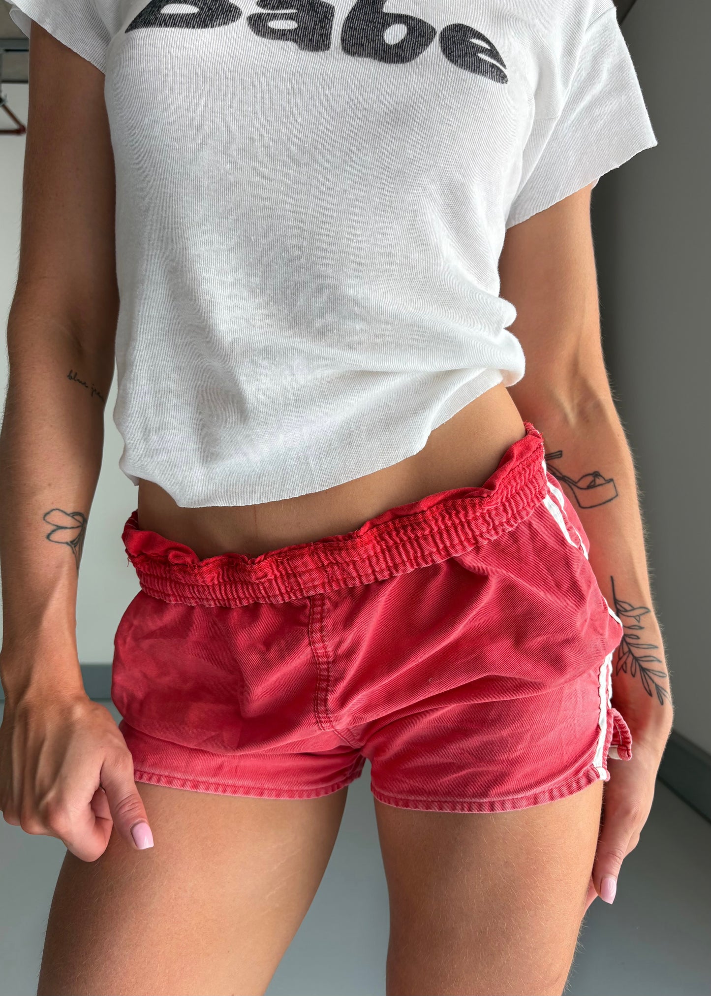 faded red sports shorts