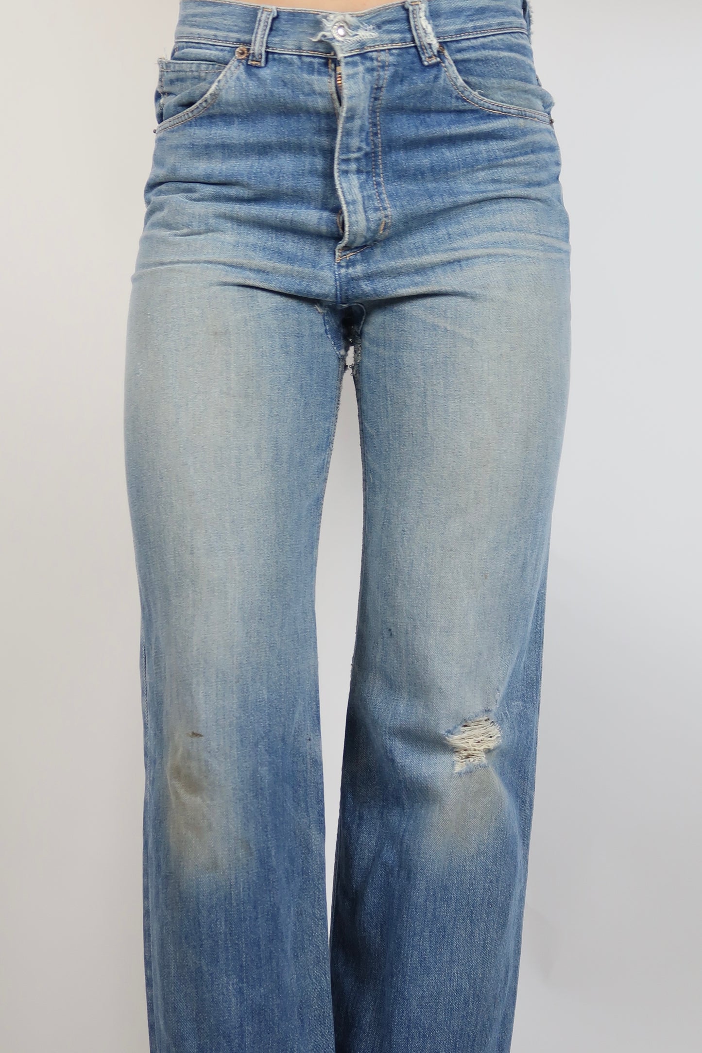 Early 1970s super worn in straight leg jeans