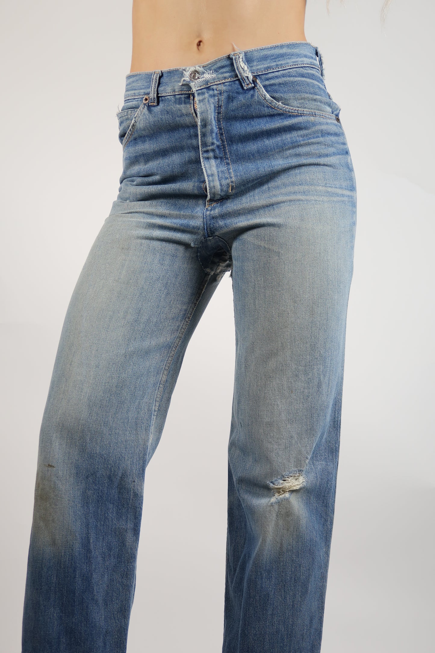 Early 1970s super worn in straight leg jeans