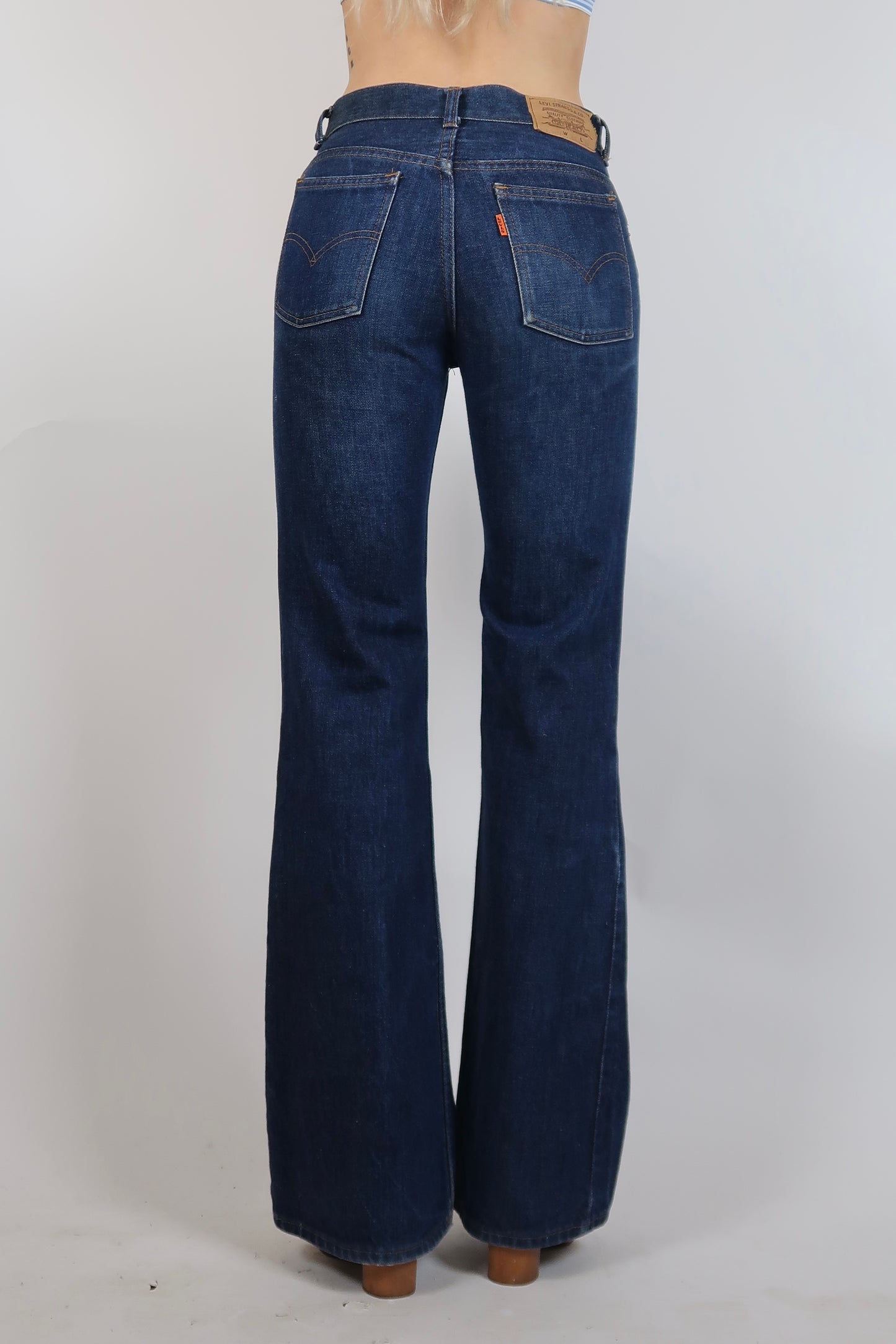 1970s Orange tab dark wash flare jeans