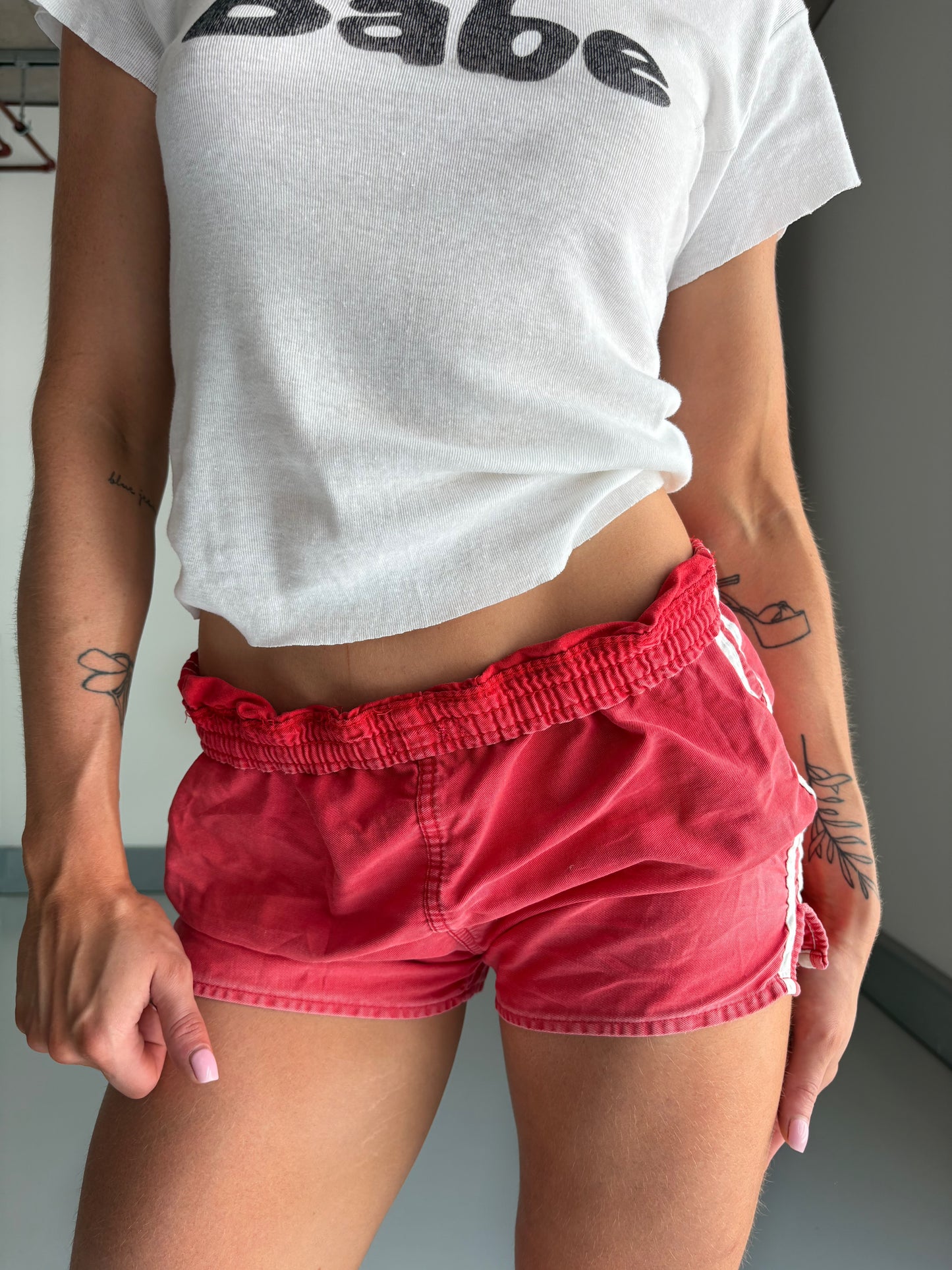 faded red sports shorts