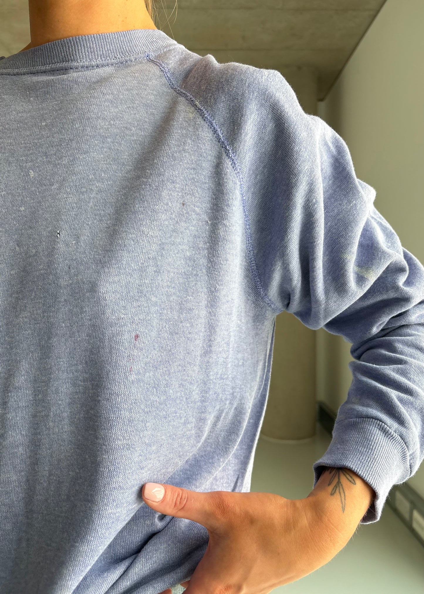 70s worn in sweatshirt
