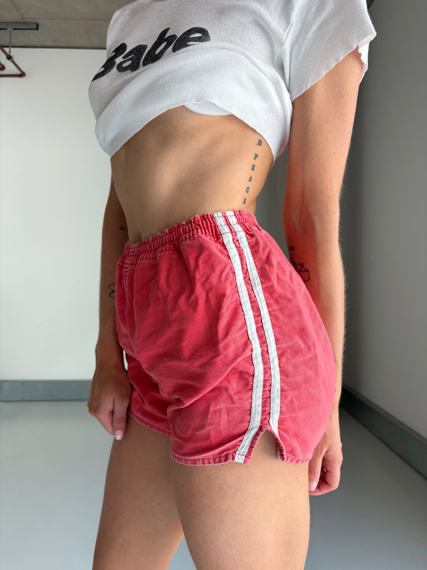 faded red sports shorts